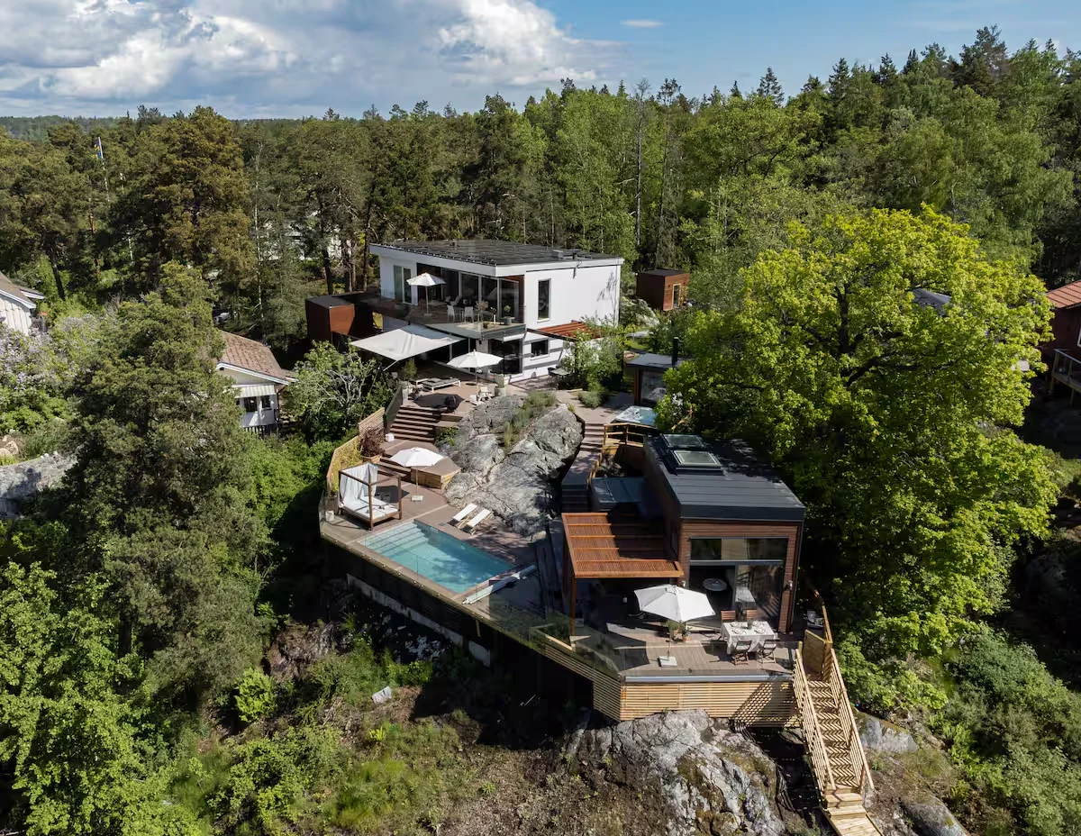 Aerial view of Villa Bianca above the water near Stockholm